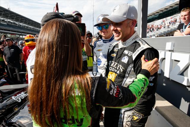 Ed Carpenter is congratulated by teammates Danica Patrick and Spencer Pigot on pit lane after winning the pole position for the 102nd Indianapolis 500 at the Indianapolis Motor Speedway -- Photo by: Joe Skibinski