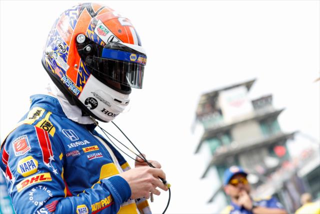 Alexander Rossi Looks over his communication cords along pit lane prior to his qualification attempt for the 102nd Indianapolis 500 at the Indianapolis Motor Speedway -- Photo by: Joe Skibinski