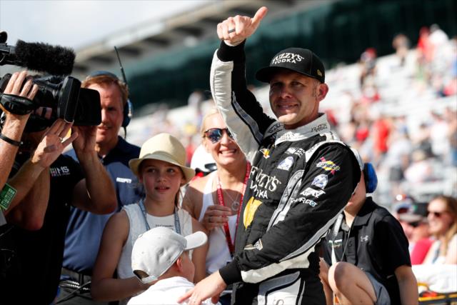 Ed Carpenter begins the celebration on pit lane after winning the pole position for the 102nd Indianapolis 500 at the Indianapolis Motor Speedway -- Photo by: Joe Skibinski