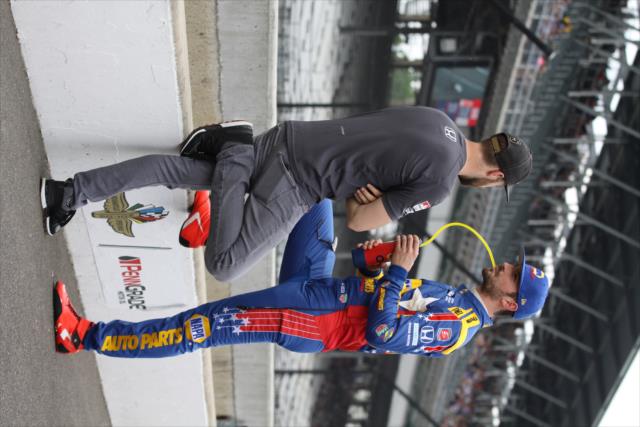 Alexander Rossi chats with James Hinchcliffe in pit lane during qualifications for the 102nd Indianapolis 500 at the Indianapolis Motor Speedway -- Photo by: Matt Fraver