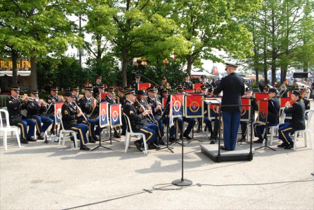 The 38th Infantry Division Band plays during the Armed Forces enlistment ceremony on Sunday morning at the Indianapolis Motor Speedway. -- Photo by: Mike Young