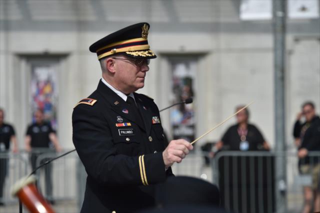 The 38th Infantry Divison Band conductor during the enlistment ceremony during Armed Services Day at the Indianapolis Motor Speedway -- Photo by: Mike Young