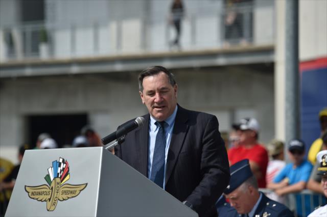 United States Senator Joe Donnelly addresses the gathered during Armed Services Day at the Indianapolis Motor Speedway -- Photo by: Mike Young