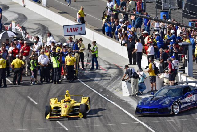 Helio Castroneves peels out of pit lane to start his qualification attempt for the 102nd Indianapolis 500 at the Indianapolis Motor Speedway -- Photo by: Walter Kuhn