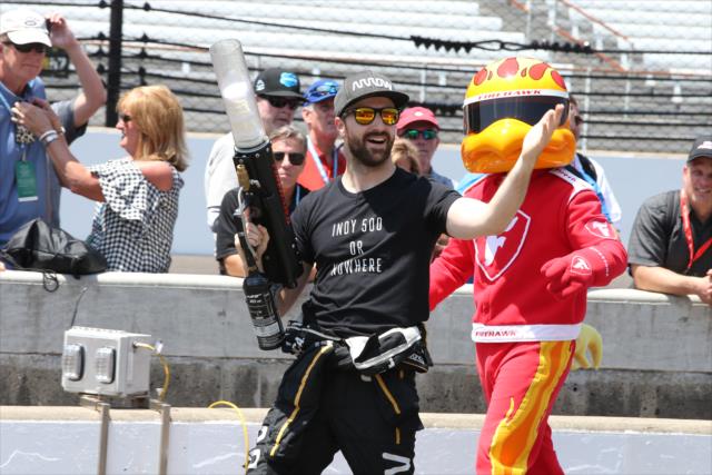 James Hinchcliffe amps up the crowd with the t-shirt cannon during the pit stop competition on Miller Lite Carb Day at the Indianapolis Motor Speedway -- Photo by: Chris Jones