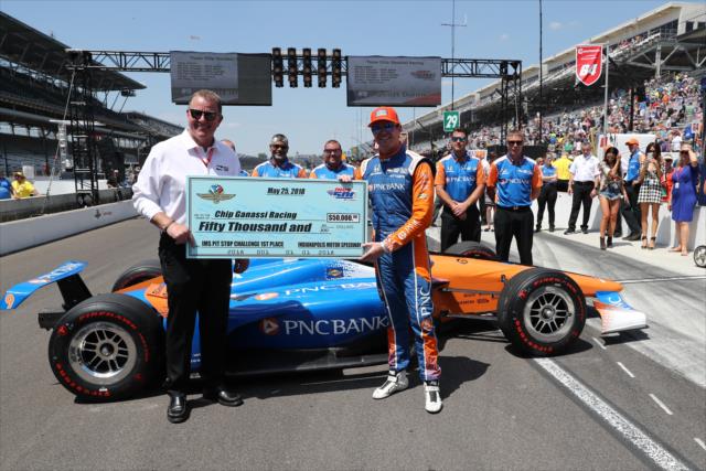 Scott Dixon accepts the check on behalf of Chip Ganassi Racing for winning the 2018 pit stop competition on Miller Lite Carb Day at the Indianapolis Motor Speedway -- Photo by: Chris Jones