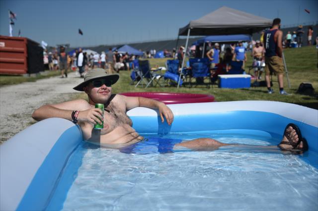 Fans gear up and cool down during Carb Day festivities at the Indianapolis Motor Speedway -- Photo by: Dana Garrett