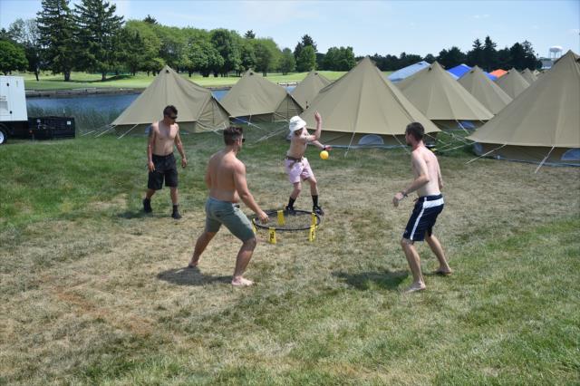 Fans enjoy a little spikeball in the glamping campground on the infield during Miller Lite Carb Day at the Indianapolis Motor Speedway -- Photo by: Dana Garrett