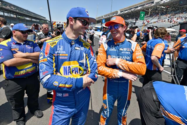 Alexander Rossi and Scott Dixon chat on pit lane prior to their duel in the 2018 pit stop challenge on Miller Lite Carb Day at the Indianapolis Motor Speedway -- Photo by: John Cote