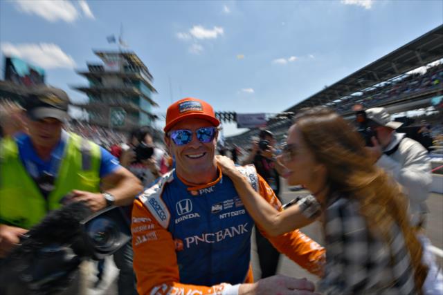 Scott Dixon is congratulated by his wife, Emma, on pit lane after winning the 2018 pit stop competition during Miller Lite Carb Day at the Indianapolis Motor Speedway -- Photo by: John Cote