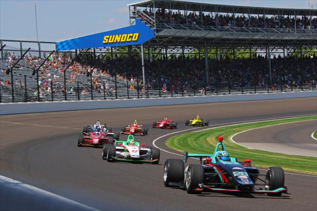 Dalton Kellett leads the field through Turn 1 during the start of the 2018 Freedom 100 at the Indianapolis Motor Speedway -- Photo by: Mike Harding