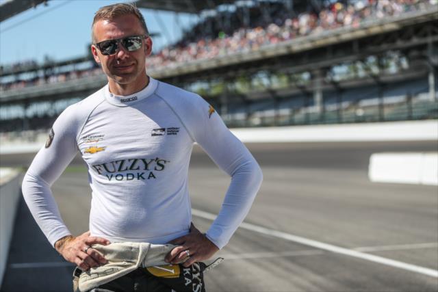 Ed Carpenter looks down pit lane prior to the final practice for the 102nd Indianapolis 500 on Miller Lite Carb Day at the Indianapolis Motor Speedway -- Photo by: Shawn Gritzmacher