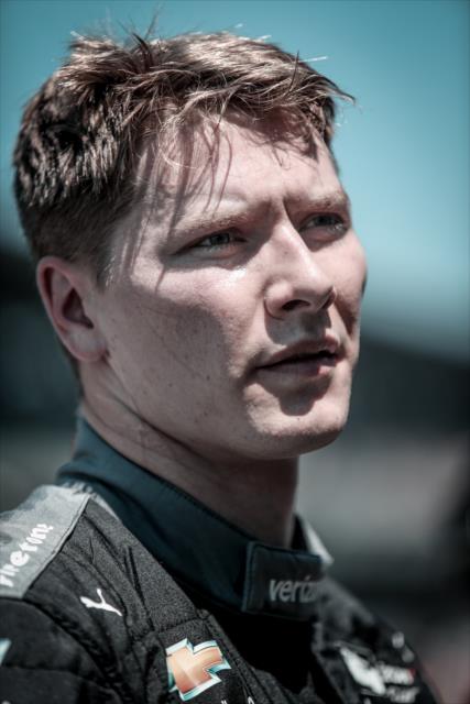 Josef Newgarden chats with his team on pit lane following the final practice during Miller Lite Carb Day at the Indianapolis Motor Speedway -- Photo by: Shawn Gritzmacher