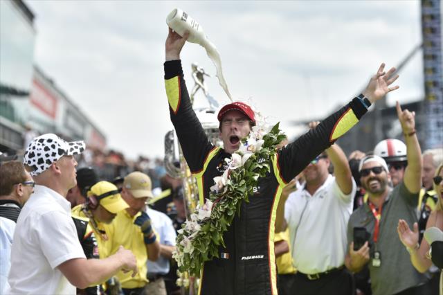 Simon Pagenaud pours the milk in celebration of his victory of the 103rd Indianapolis 500 presented by Gainbridge -- Photo by: Chris Owens