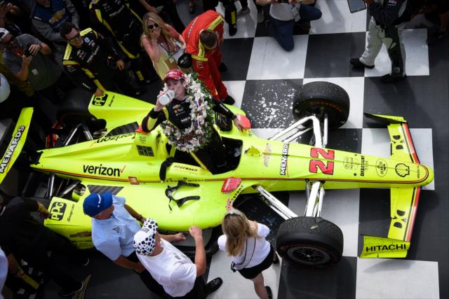 Simon Pagenaud drinks the milk in Victory Circle after winning the 103rd Indianapolis 500 presented by Gainbridge -- Photo by: James  Black