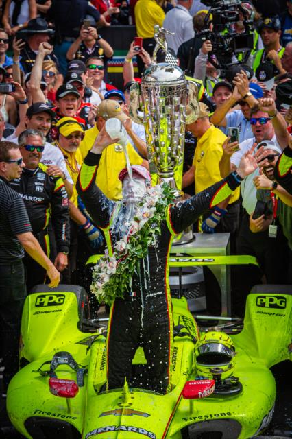 Simon Pagenaud celebrates in Victory Circle after winning the 103rd Running of the Indianapolis 500 presented by Gainbridge -- Photo by: Karl Zemlin
