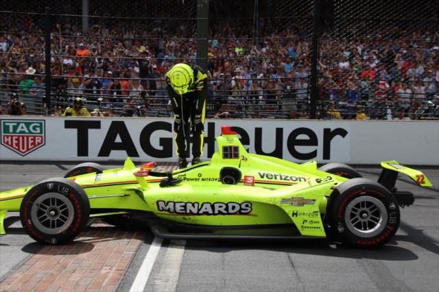 Simon Pagenaud celebrates on the Yard of Bricks after winning the 103rd Indianapolis 500 -- Photo by: Matt Fraver