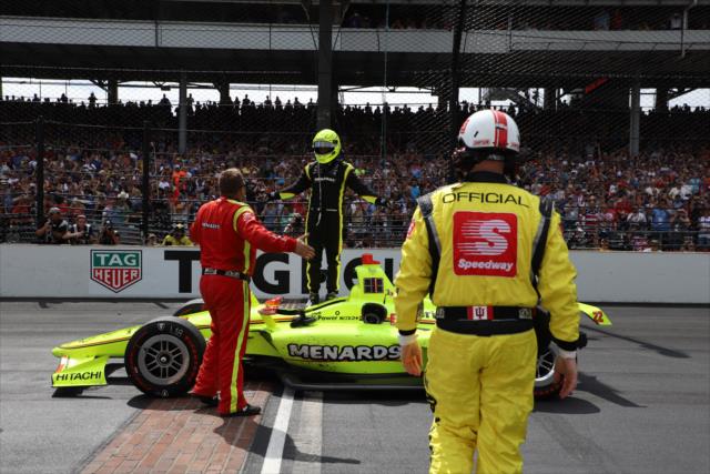 Simon Pagenaud celebrates on the Yard of Bricks after winning the 103rd Indianapolis 500 -- Photo by: Matt Fraver