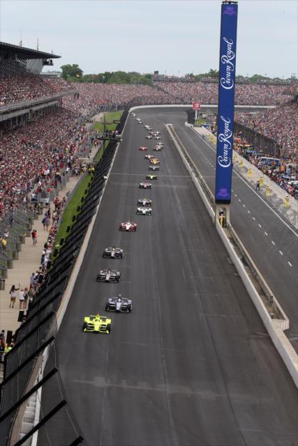 Simon Pagenaud lead the field during the opening laps of the 103rd Running of the Indianapolis 500 presented by Gainbridge -- Photo by: Richard Dowdy
