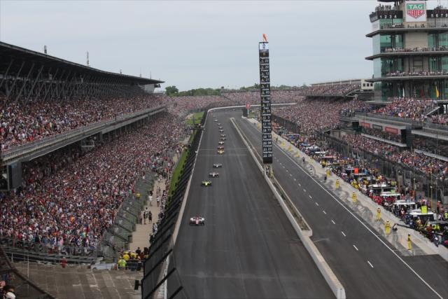 The field races during the opening laps of the 103rd Running of the Indianapolis 500 presented by Gainbridge -- Photo by: Richard Dowdy