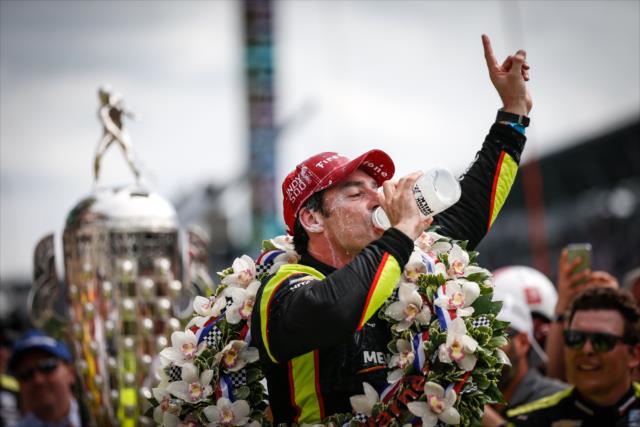 Simon Pagenaud celebrates in Victory Circle after winning the 103rd Running of the Indianapolis 500 presented by Gainbridge -- Photo by: Shawn Gritzmacher