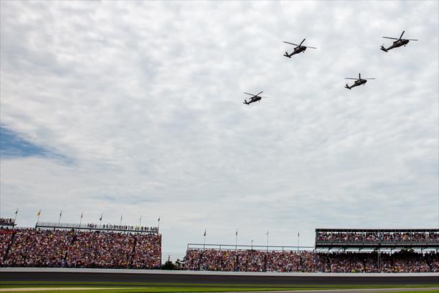 Helicopters perform a flyover during pre-race. -- Photo by: Stephen King