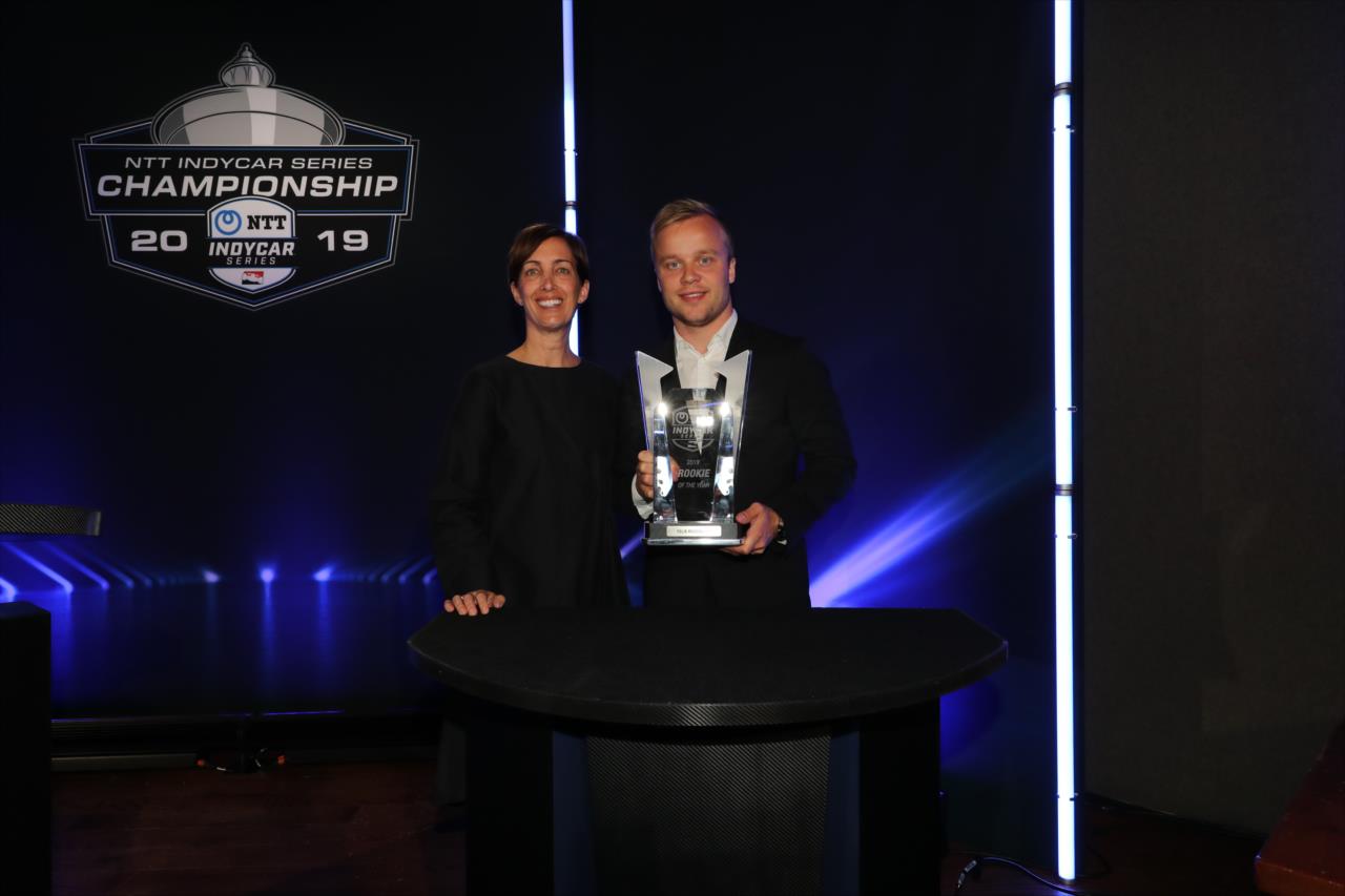 Chip Ganassi Racing's Felix Rosenqvist with Lisa Boggs, Director of Motorsports for Bridgestone Americas, receiving his 2019 Rookie of the Year award during the Victory Lap Celebration at Union 50 in downtown Indianapolis -- Photo by: Chris Owens