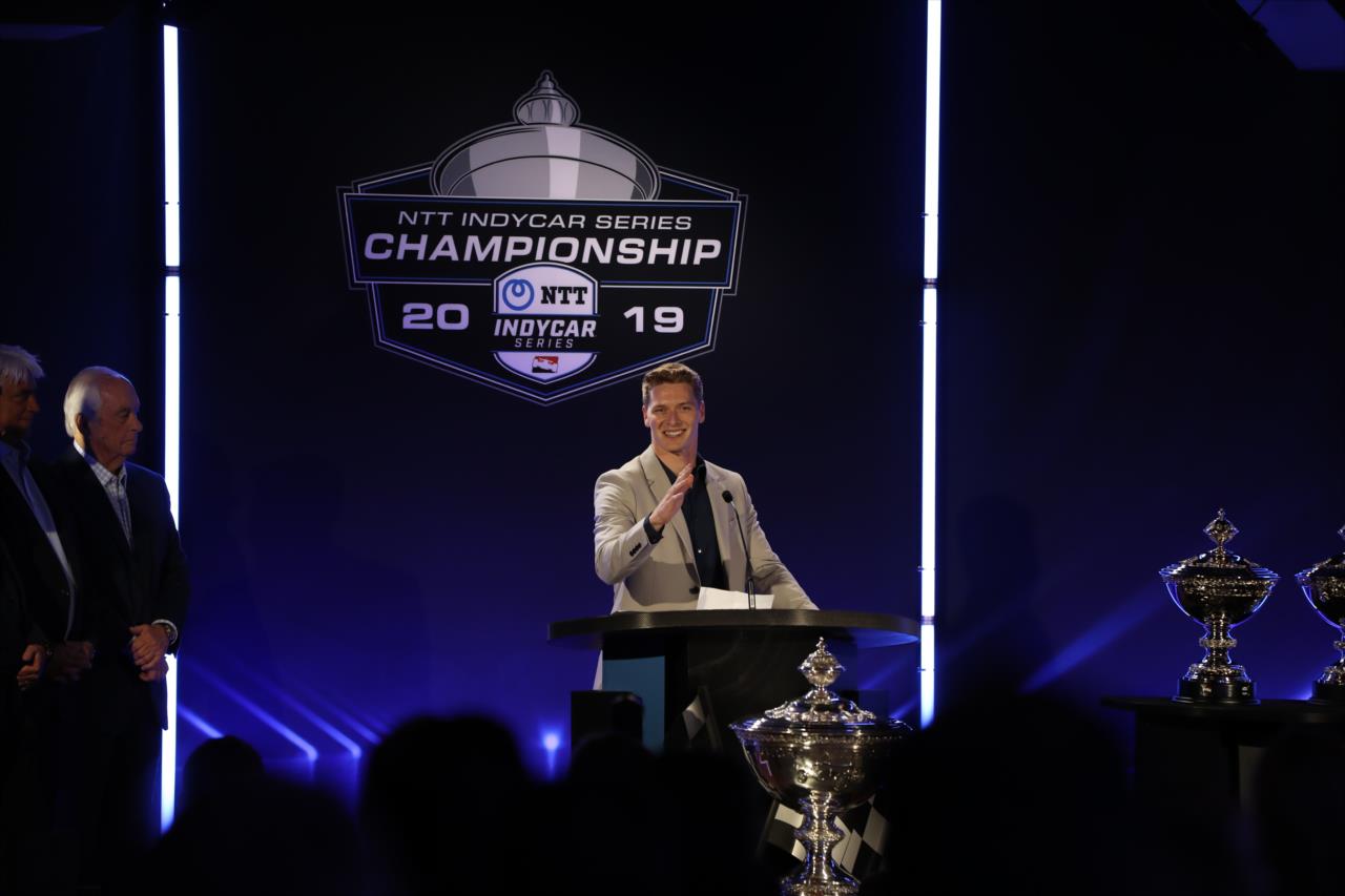 Joseph Newgarden addresses the audience during the Victory Lap Celebration at Union 50 in downtown Indianapolis -- Photo by: Chris Owens