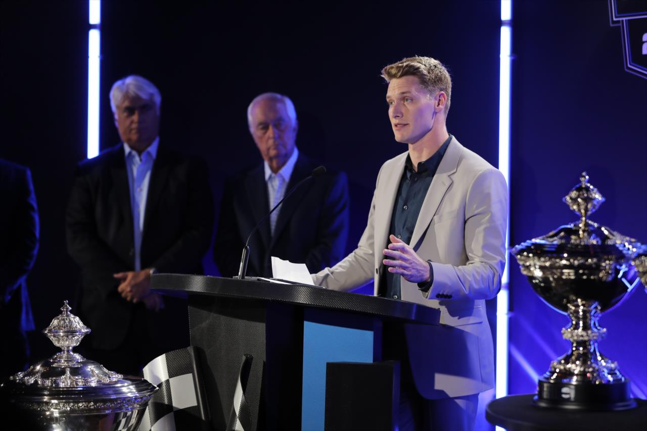 Josef Newgarden addresses the audience during the Victory Lap Celebration at Union 50 in downtown Indianapolis -- Photo by: Chris Owens