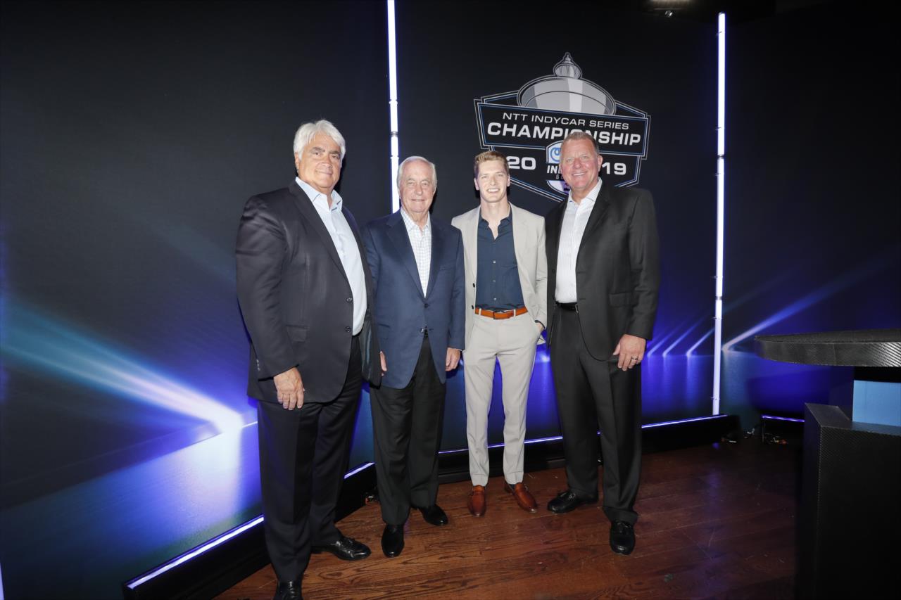 Hulman & Co. CEO Mark Miles, Roger Penske, 2019 NTT IndyCar Series champion Josef Newgarden, and INDYCAR President Jay Frye on stage during the Victory Lap Celebration at Union 50 in downtown Indianapolis -- Photo by: Joe Skibinski