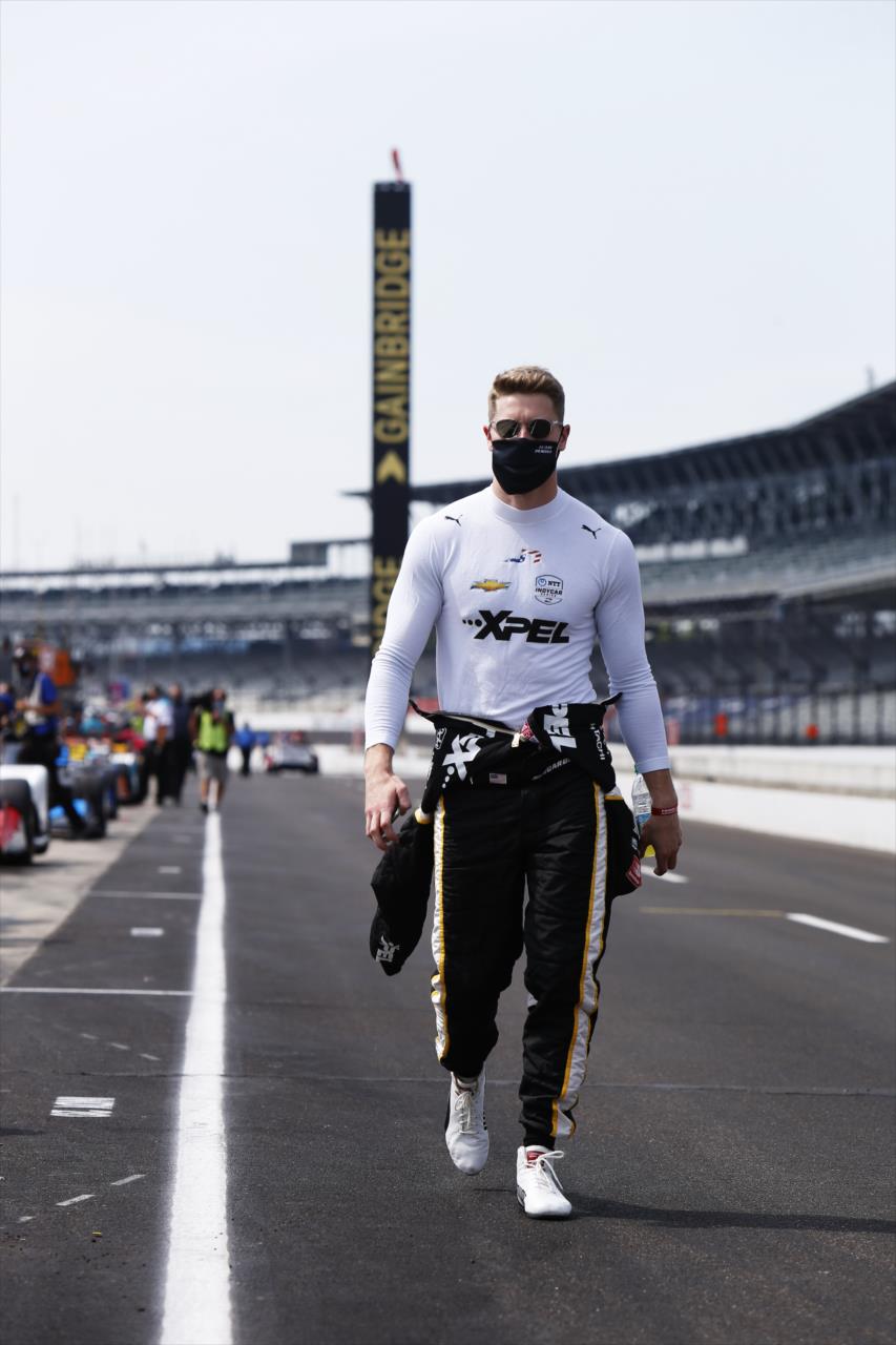 Josef Newgarden walks down pit lane prior to practice for the GMR Grand Prix on the Indianapolis Motor Speedway Road Course -- Photo by: Chris Jones