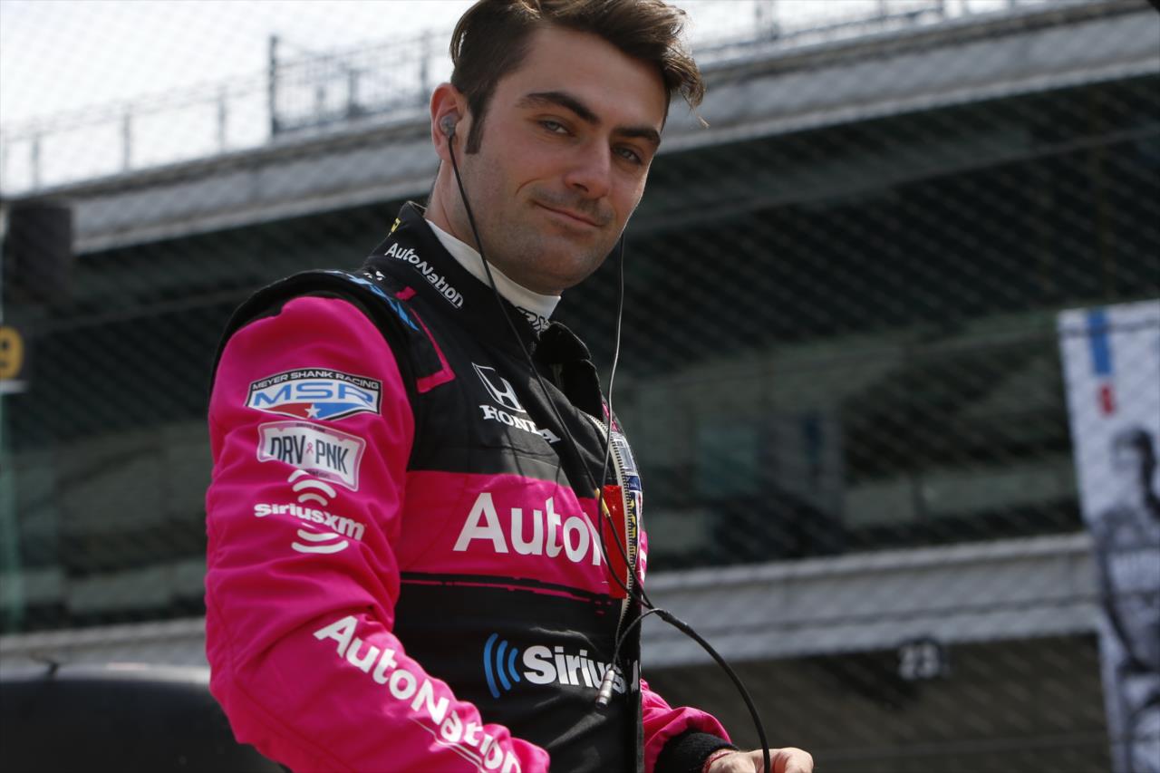 Jack Harvey waits along pit lane prior to practice for the GMR Grand Prix on the Indianapolis Motor Speedway Road Course -- Photo by: Chris Jones