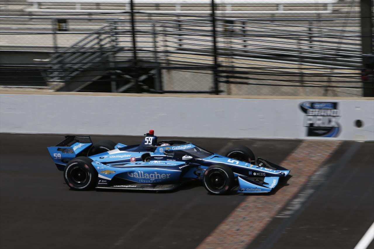 Max Chilton flashes across the yard of bricks during qualifications for the GMR Grand Prix on the Indianapolis Motor Speedway Road Course -- Photo by: Chris Jones