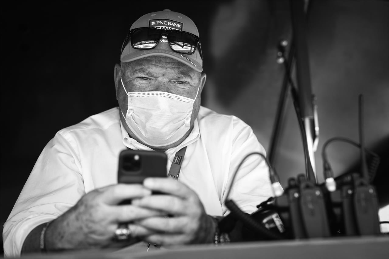 Team Owner Chip Ganassi looks on from the pit stand during practice for the GMR Grand Prix on the Indianapolis Motor Speedway Road Course -- Photo by: Chris Owens