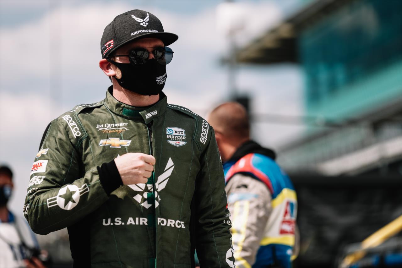 Conor Daly walks pit lane prior to practice for the GMR Grand Prix on the Indianapolis Motor Speedway Road Course -- Photo by: Joe Skibinski