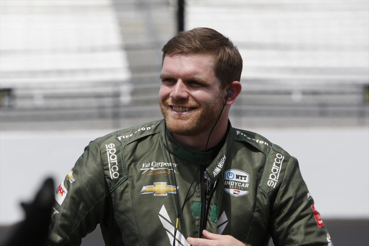 Conor Daly wais on pit lane prior to the start of the GMR Grand Prix at the Indianapolis Motor Speedway -- Photo by: Chris Jones