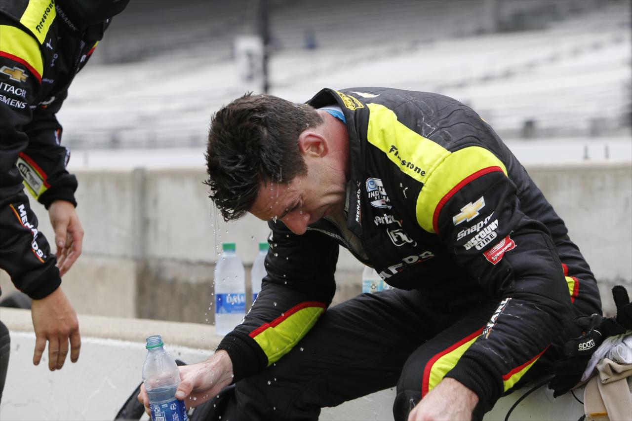 An exhausted Simon Pagenad cools down on pit lane after his 3rd Place finish in the 2020 GMR Grand Prix at the Indianapolis Motor Speedway -- Photo by: Chris Jones