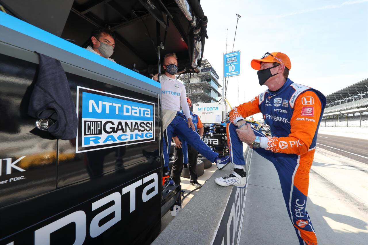 Scott Dixon chats with teammate Felix Rosenqvist on pit lane prior to the start of the final warmup for the 2020 GMR Grand Prix at the Indianapolis Motor Speedway  -- Photo by: Chris Owens