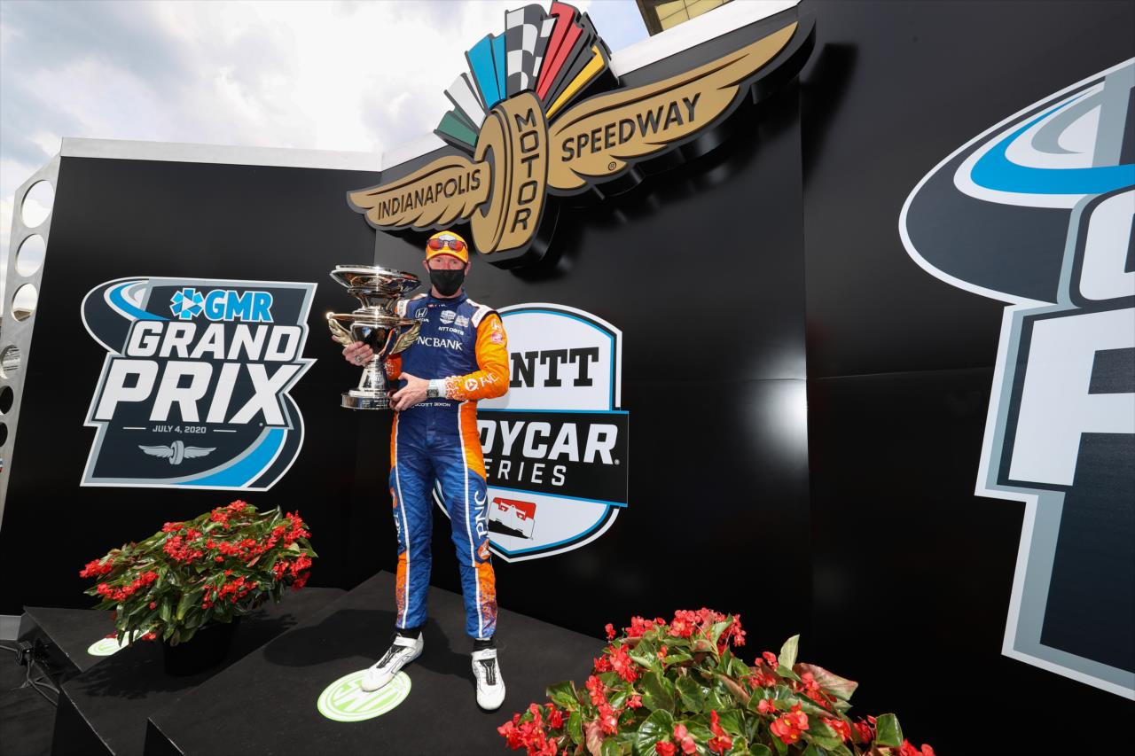 Scott Dixon on the podium as the winner of the 2020 GMR Grand Prix at the Indianapolis Motor Speedway -- Photo by: Chris Owens