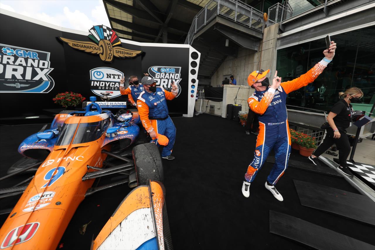 Scott Dixon takes a selfie with his team on the new Victory Circle stage after winning the 2020 GMR Grand Prix at Indianapolis -- Photo by: Chris Owens