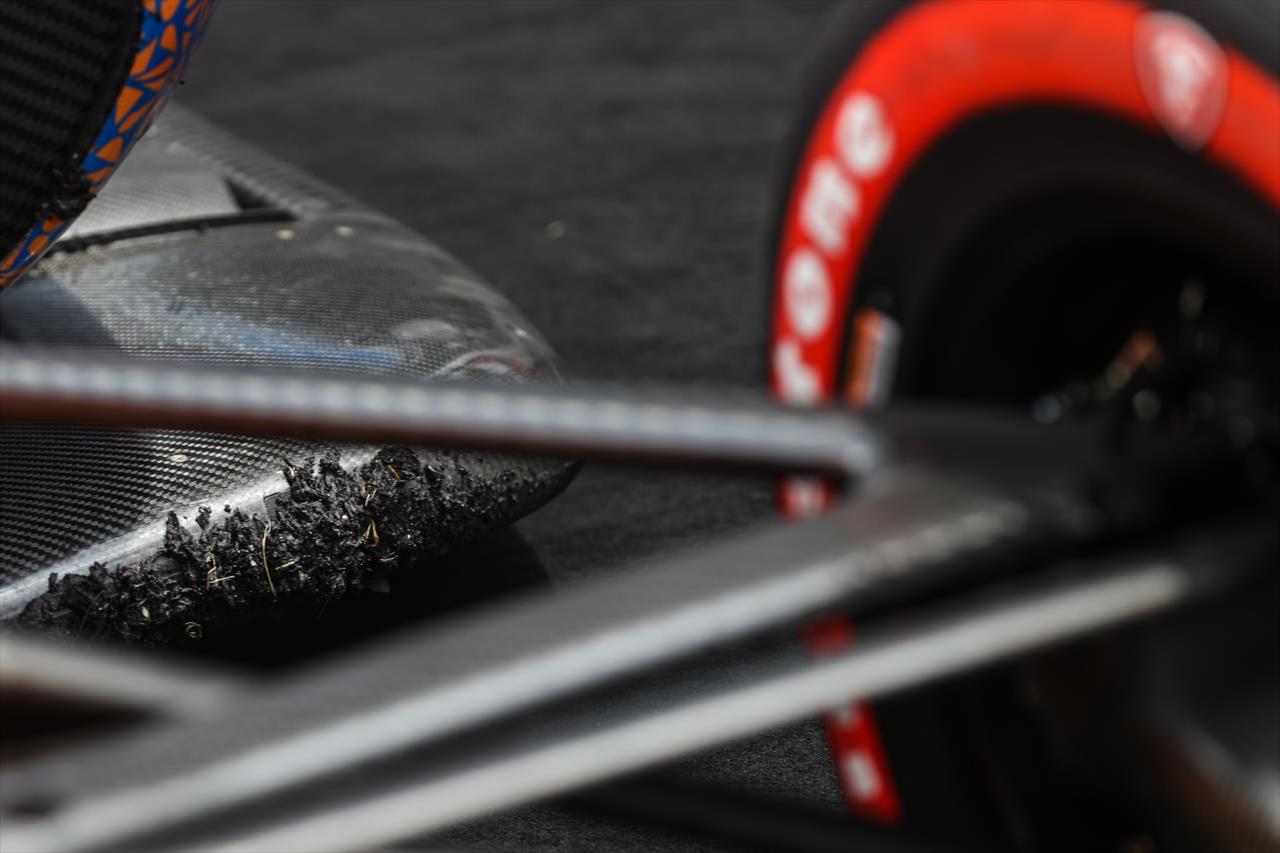 Battle scars adorn the No. 9 PNC Bank Honda of Scott Dixon in Victory Circle after winning the 2020 GMR Grand Prix at Indianapolis -- Photo by: Chris Owens