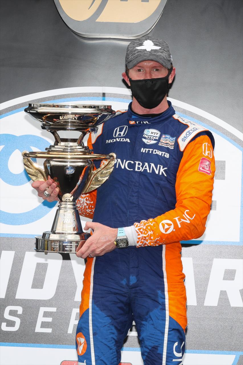 Scott Dixon with his trophy in Victory Circle after winning the 2020 GMR Grand Prix at Indianapolis -- Photo by: Chris Owens