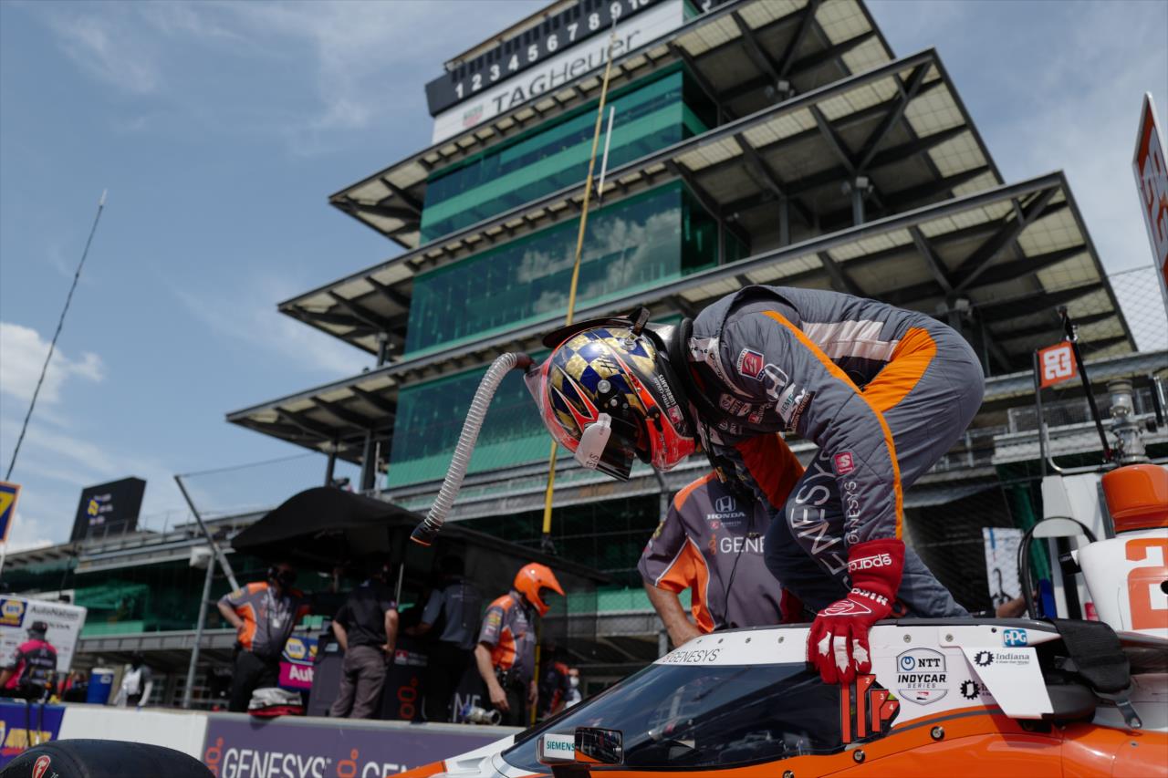 James Hinchcliffe slides into his No. 29 Genesys Honda on pit lane prior to the start of the final warmup for the 2020 GMR Grand Prix at the Indianapolis Motor Speedway -- Photo by: Chris Owens