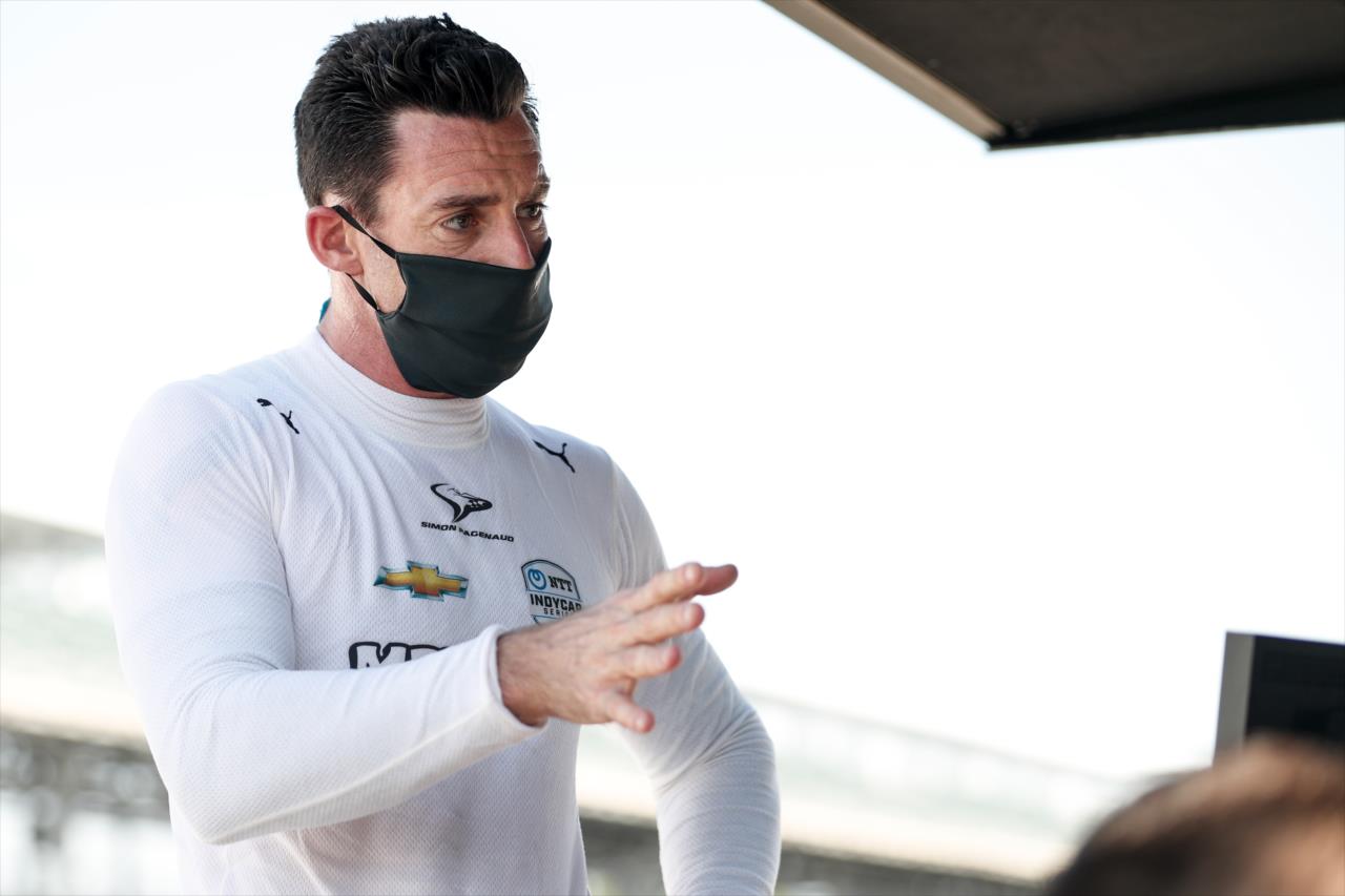 Simon Pagenaud chats with his team in the Team Penske pitstand following the final warmup for the 2020 GMR Grand Prix at the Indianapolis Motor Speedway -- Photo by: Joe Skibinski