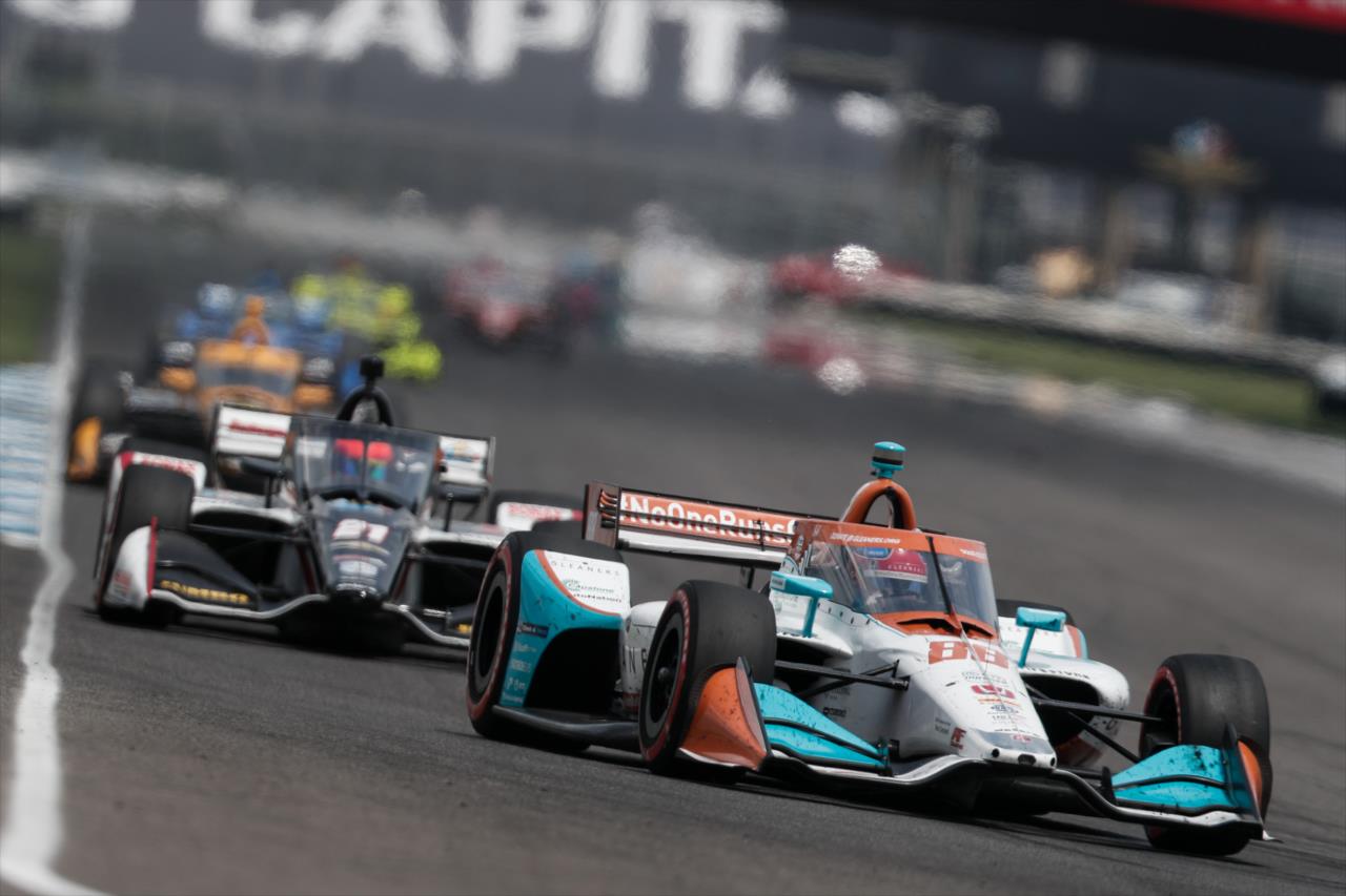 Colton Herta and Rinus VeeKay lead a train of cars setting up for Turn 7 during the 2020 GMR Grand Prix at Indianapolis -- Photo by: Joe Skibinski