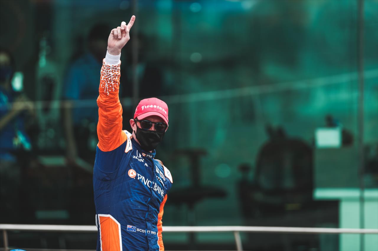 Scott Dixon celebrates on Victory Circle after winning the 2020 GMR Grand Prix at Indianapolis -- Photo by: Joe Skibinski