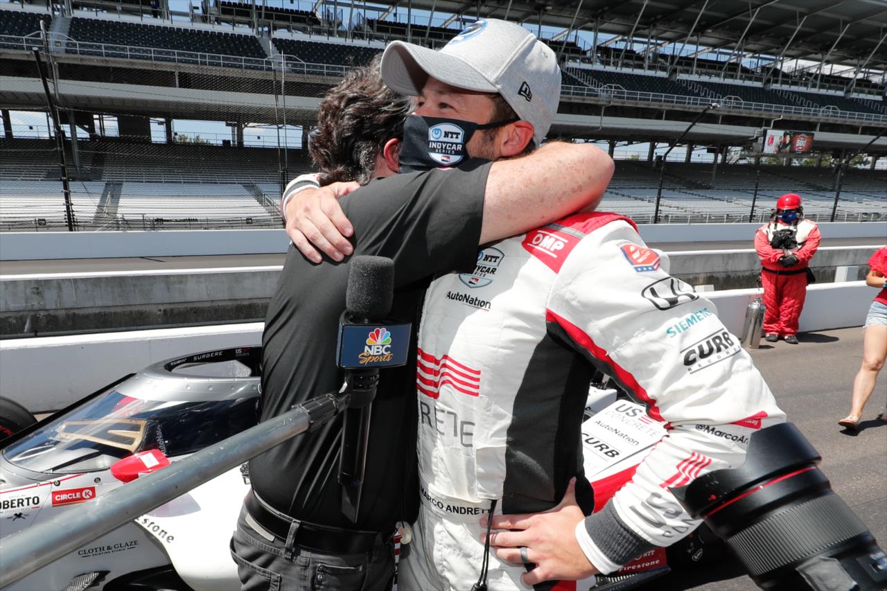 Marco Andretti hugs his father and team owner Michael Andretti on Pole Day for the Indianapolis 500 at the Indianapolis Motor Speedway Sunday, August 16, 2020 -- Photo by: Joe Skibinski