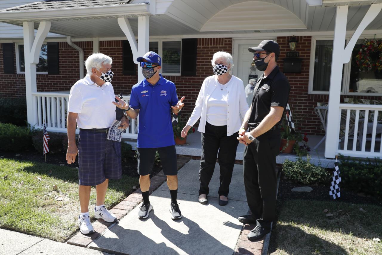 Tony Kanaan and Simon Pagenaud visit with race fans on Legends Day. -- Photo by: Chris Jones
