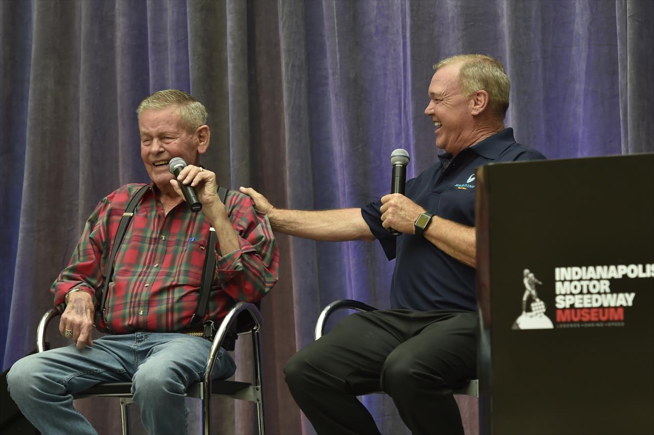 Three-time Indianapolis 500 champion Bobby Unser chats with nephew and two-time Indianapolis 500 champion Al Unser Jr. at the Indianapolis Motor Speedway Museum