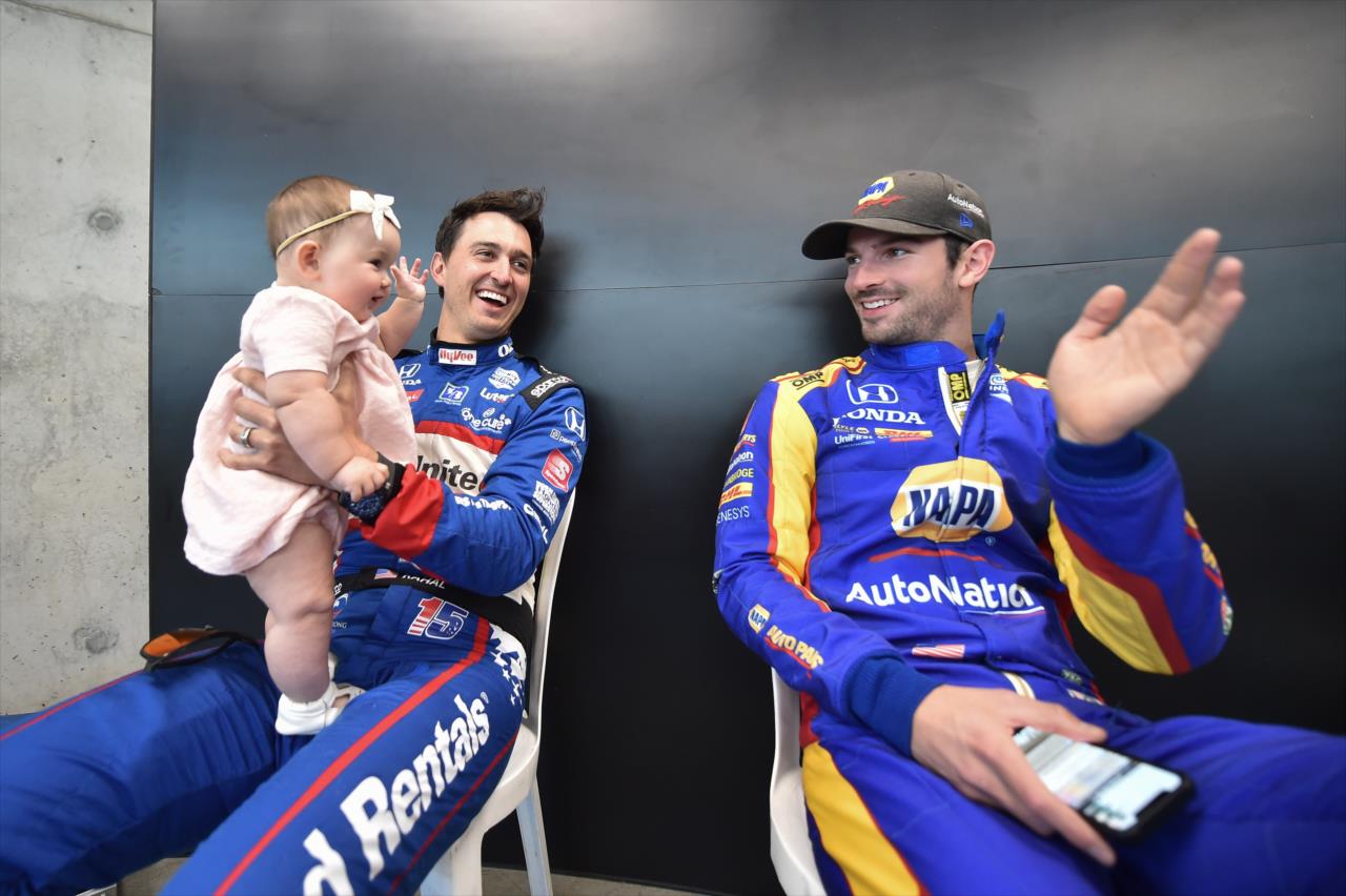 Graham Rahal with daughter Harlan and Alexander Rossi - 105th Running of the Indianapolis 500 presented by Gainbridge -- Photo by: Chris Owens